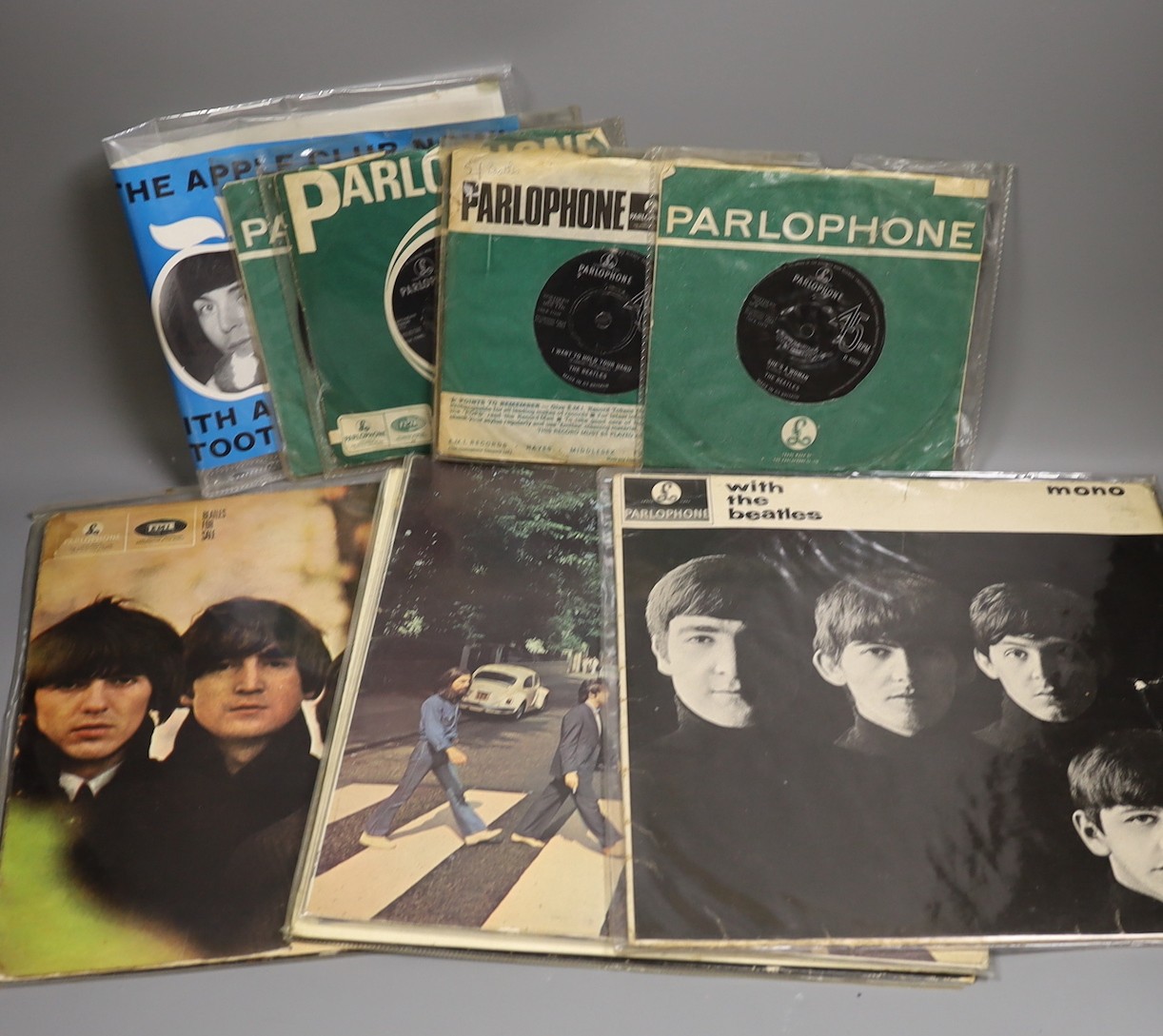 A rare blue, early Beatles poster 1962, five 45 single records and five LP’s